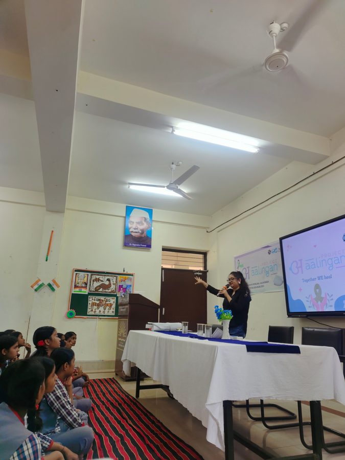 A WE Foundation facilitator addressing students